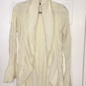 Women’s cream colored ruffled sweater. Size L